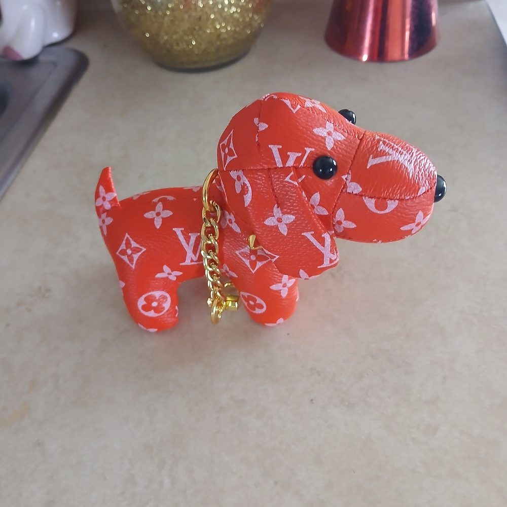 Chic Red Dog with Gold Chain.